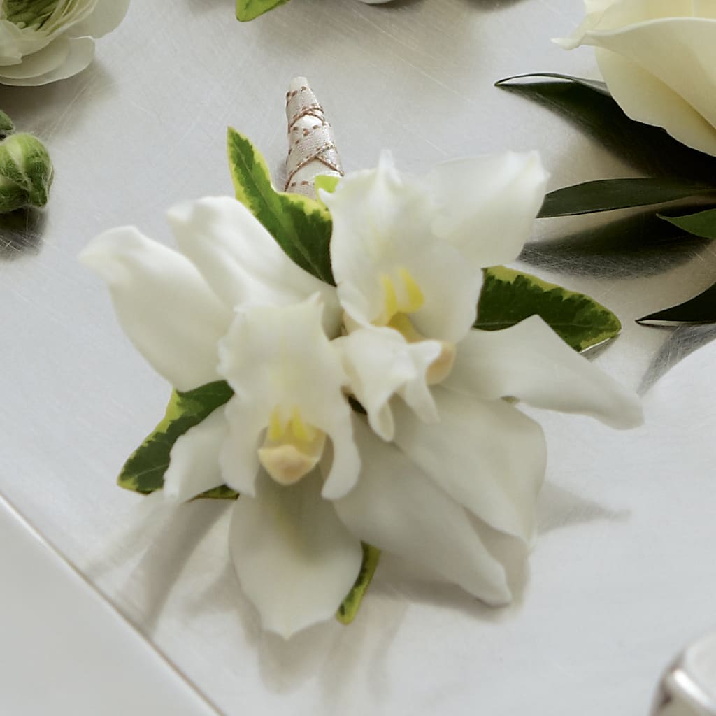 White Mini Cymbidium Boutonniere – Babes Floral Design Llc, Old Fort NC